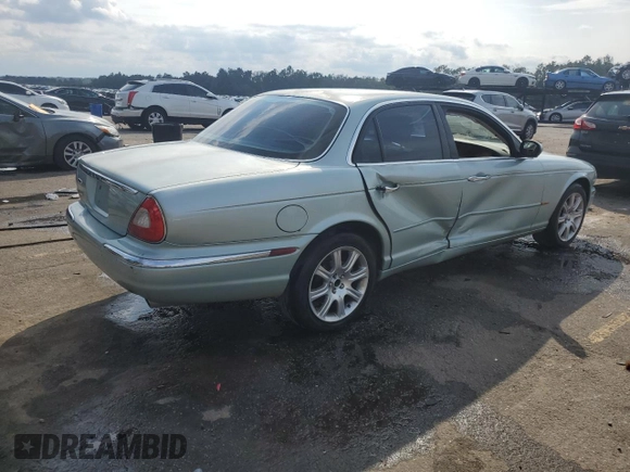 2004 Jaguar XJ with VIN SAJWA71C94SG24466, listed as a Copart auction lot 46610995 with 173,570 mi miles and Salvage Title. Bid and sale history available at carsss.com. Image 3.