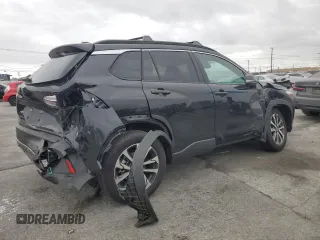 2024 Toyota Corolla Cross XLE with VIN 7MUDAAAG8RV095021, listed as a Copart auction lot 59232265 with 7,010 mi miles and Salvage title. Bid and sale history available at DreamBid. Image 3.