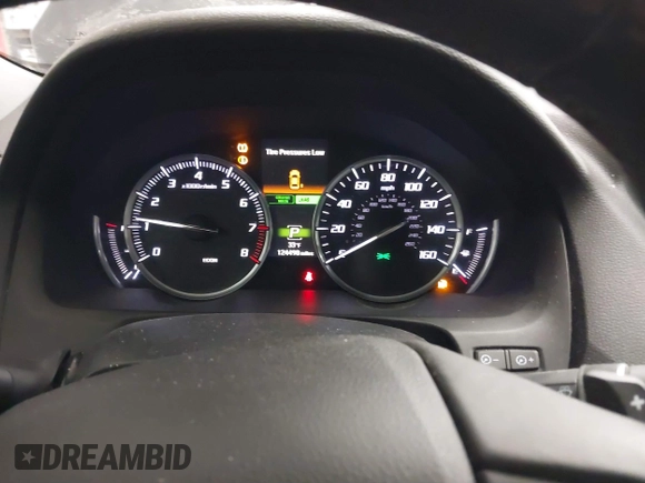 2015 Acura TLX Technology with VIN 19UUB1F51FA002302, listed as a IAAI auction lot 41450716 with 124,498 mi miles and . Bid and sale history available at DreamBid. Image 7.