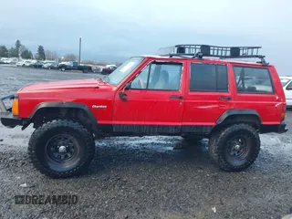 1996 Jeep Cherokee Sport with VIN 1J4FJ68S4TL244893, listed as a IAAI auction lot 41190369 with 192,459 mi miles and . Bid and sale history available at DreamBid. Image 15.
