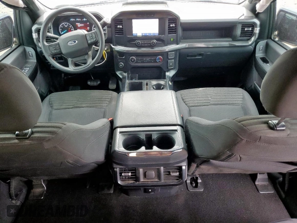 2023 Ford F-150 XL with VIN 1FTEW1CP8PKD11810, listed as a Copart auction lot 60453315 with 83,312 mi miles and Salvage title. Bid and sale history available at DreamBid. Image 8.