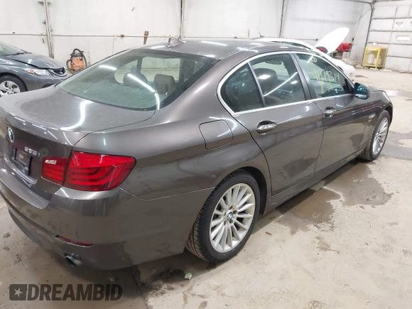 2011 BMW 5 Series 535i xDrive with VIN WBAFU7C53BDU54623, listed as a IAAI auction lot 41979314 with 202,522 mi miles. Bid and sale history available at carsss.com. Image 4.