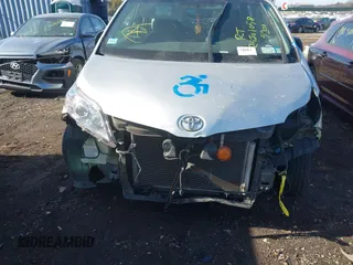 2014 Toyota Sienna L with VIN 5TDZK3DC8ES476153, listed as a IAAI auction lot 41462668 with 999,999 mi miles. Bid and sale history available at carsss.com. Image 11.