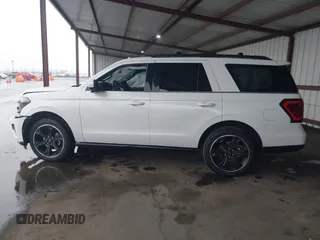 2023 Ford Expedition Limited with VIN 1FMJU2A89PEA47772, listed as a IAAI auction lot 41242800 with 14,512 mi miles. Bid and sale history available at carsss.com. Image 14.