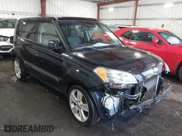 2010 Kia Soul + with VIN KNDJT2A21A7095510, listed as a IAAI auction lot 41879972 with 212,538 mi miles. Bid and sale history available at carsss.com. Image 1.