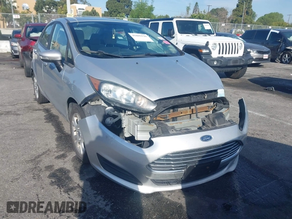 2016 Ford Fiesta SE with VIN 3FADP4BJ6GM205412, listed as a IAAI auction lot 41809126 with 100,941 mi miles. Bid and sale history available at carsss.com. Image 1.