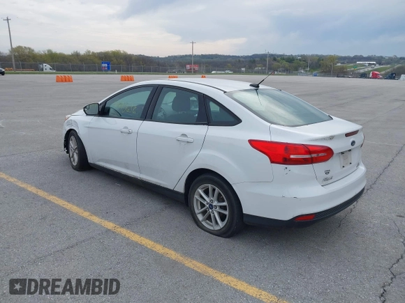 2015 Ford Focus SE with VIN 1FADP3F23FL255584, listed as a IAAI auction lot 41990636 with 151,389 mi miles. Bid and sale history available at carsss.com. Image 3.