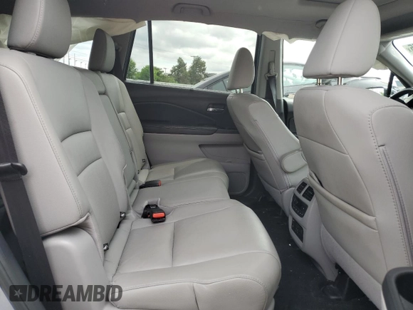 2019 Honda Pilot Touring 8-Passenger z VIN 5FNYF5H91KB033661, wystawiony jako Copart lot #56650155 z przebiegiem 73 512 mil mil oraz Szkoda całkowita • Salvage title. Historia ofert i sprzedaży dostępna na DreamBid. Obrazek 11.