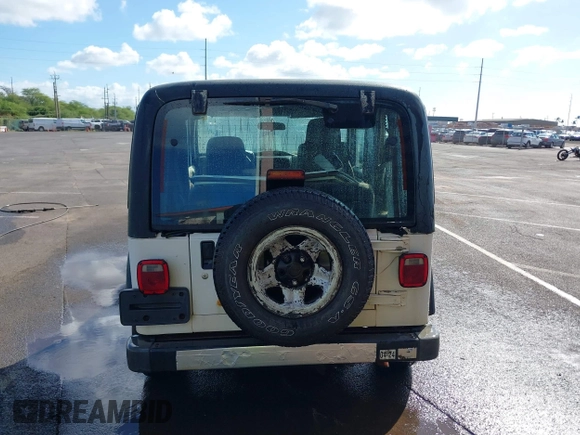 2004 Jeep Wrangler X z VIN 1J4FA39S04P747828, wystawiony jako IAAI lot #41484240 z przebiegiem Nie podano mil oraz . Historia ofert i sprzedaży dostępna na DreamBid. Obrazek 17.