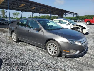 2012 Ford Fusion SEL with VIN 3FAHP0JA7CR387288, listed as a Copart auction lot 56968885 with 169,802 mi miles and Salvage title. Bid and sale history available at DreamBid. Image 4.