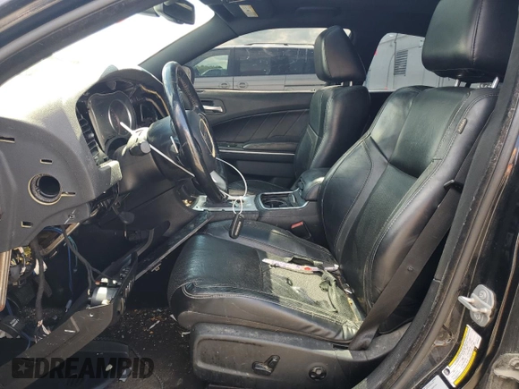 2015 Dodge Charger RT with VIN 2C3CDXCT9FH784672, listed as a Copart auction lot 58190615 with 121,033 mi miles and Salvage title. Bid and sale history available at DreamBid. Image 7.