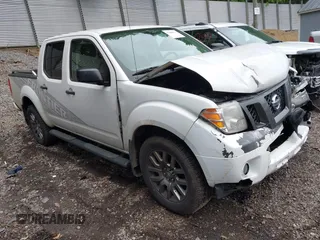 2012 Nissan Frontier Pro-4X with VIN 1N6AD0EV7CC409206, listed as a IAAI auction lot 42388170 with 126,411 mi miles and . Bid and sale history available at DreamBid. Image 1.