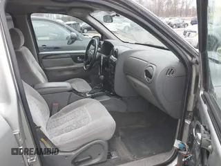 2004 GMC Envoy SLT with VIN 1GKDT13S242398113, listed as a IAAI auction lot 41722942 with 175,173 mi miles and . Bid and sale history available at DreamBid. Image 5.