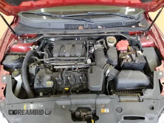 2013 Ford Taurus SEL z VIN 1FAHP2E8XDG187341, wystawiony jako Copart lot #47466825 z przebiegiem 177 134 mil mil oraz Szkoda całkowita • Salvage title. Historia ofert i sprzedaży dostępna na DreamBid. Obrazek 11.