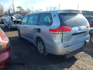 2014 Toyota Sienna L with VIN 5TDZK3DC8ES476153, listed as a IAAI auction lot 41462668 with 999,999 mi miles. Bid and sale history available at carsss.com. Image 3.