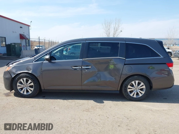 2014 Honda Odyssey EX-L z VIN 5FNRL5H64EB031426, wystawiony jako IAAI lot #41777542 z przebiegiem 162 426 mil mil oraz . Historia ofert i sprzedaży dostępna na DreamBid. Obrazek 14.