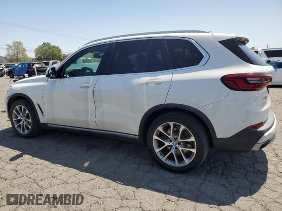 2019 BMW X5 xDrive40i with VIN 5UXCR6C52KLL35774, listed as a Copart auction lot 51802385 with 99,311 mi miles and Clean Title. Bid and sale history available at carsss.com. Image 2.