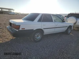 1989 Toyota Camry z VIN 4T1SV24E5KU019985, wystawiony jako Copart lot #81200104 z przebiegiem 207 103 mil mil oraz Szkoda całkowita • Salvage title. Historia ofert i sprzedaży dostępna na DreamBid. Obrazek 3.
