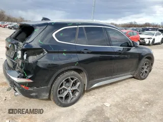 2018 BMW X1 xDrive28i with VIN WBXHT3C32J5L28030, listed as a Copart auction lot 47087415 with 100,708 mi miles and Salvage Title. Bid and sale history available at carsss.com. Image 3.