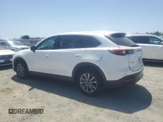 2019 Mazda CX-9 Touring with VIN JM3TCBCY3K0312986, listed as a Copart auction lot 58742195 with 119,464 mi miles and Salvage title. Bid and sale history available at DreamBid. Image 2.