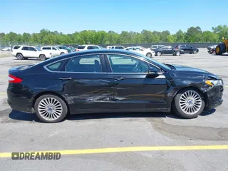 2016 Ford Fusion Titanium with VIN 3FA6P0K9XGR158234, listed as a IAAI auction lot 42043716 with 161,164 mi miles. Bid and sale history available at carsss.com. Image 13.