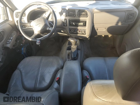 2000 GMC Jimmy SLE Convenience z VIN 1GKDT13W7Y2393191, wystawiony jako Copart lot #82301364 z przebiegiem 160 004 mil mil oraz Czysty tytuł • Clean title. Historia ofert i sprzedaży dostępna na DreamBid. Obrazek 8.