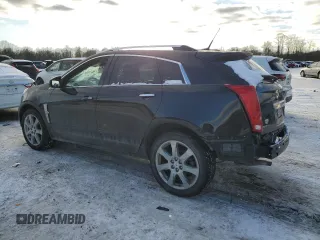 2011 Cadillac SRX Performance Collection with VIN 3GYFNEEY4BS601098, listed as a Copart auction lot 87548235 with 94,317 mi miles and Salvage Title. Bid and sale history available at carsss.com. Image 2.