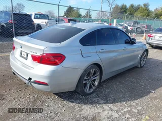 2018 BMW 4 Series 430i with VIN WBA4J1C56JBG80262, listed as a IAAI auction lot 41451833 with 148,487 mi miles and . Bid and sale history available at carsss.com. Image 4.