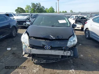 2011 Toyota Prius I z VIN JTDKN3DU7B1433806, wystawiony jako IAAI lot #42145016 z przebiegiem 185 755 mil mil oraz . Historia ofert i sprzedaży dostępna na DreamBid. Obrazek 12.