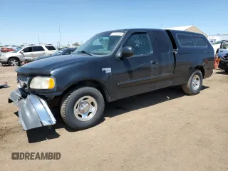1999 Ford F-150 with VIN 1FTRX17W8XKB67546, listed as a Copart auction lot 61644735 with 227,705 mi miles and Salvage title. Bid and sale history available at DreamBid. Image 1.