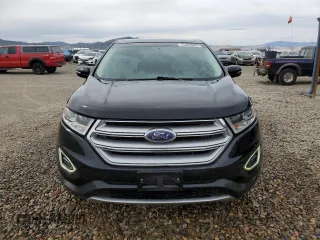 2015 Ford Edge Titanium z VIN 2FMTK4K91FBB09452, wystawiony jako Copart lot #50534735 z przebiegiem 138 446 mil mil oraz Czysty tytuł • Clean title. Historia ofert i sprzedaży dostępna na DreamBid. Obrazek 5.