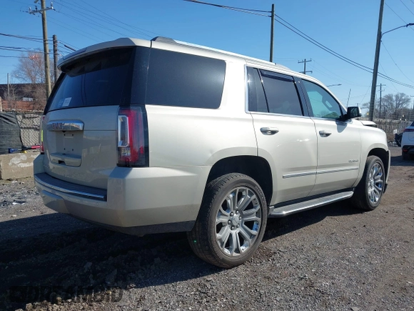 2016 GMC Yukon Denali with VIN 1GKS2CKJ5GR393269, listed as a IAAI auction lot 41963630 with 158,584 mi miles and . Bid and sale history available at DreamBid. Image 4.
