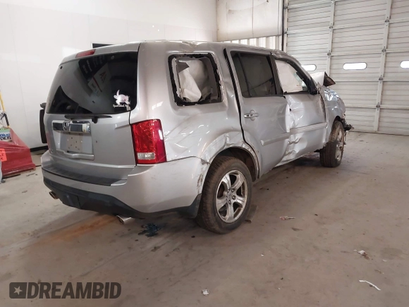 2014 Honda Pilot EX-L with VIN 5FNYF3H56EB024735, listed as a IAAI auction lot 41286284 with 101,221 mi miles. Bid and sale history available at carsss.com. Image 4.