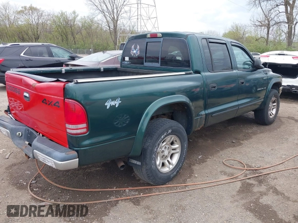 2001 Dodge Dakota Sport z VIN 1B7HG2ANX1S256902, wystawiony jako IAAI lot #42037703 z przebiegiem 121 914 mil mil oraz . Historia ofert i sprzedaży dostępna na DreamBid. Obrazek 4.