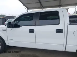 2014 Ford F-150 XL with VIN 1FTFW1CT1EKE22892, listed as a IAAI auction lot 42172851 with 14,203 mi miles and . Bid and sale history available at DreamBid. Image 14.