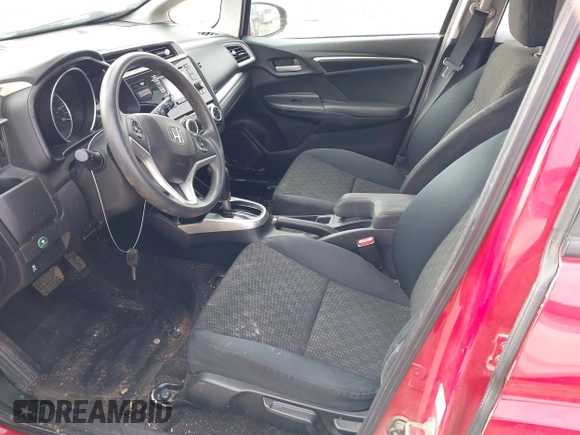 2015 Honda Fit LX z VIN 3HGGK5H54FM728448, wystawiony jako IAAI lot #41538650 z przebiegiem 115 450 mil mil oraz . Historia ofert i sprzedaży dostępna na DreamBid. Obrazek 5.