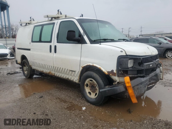 2003 Chevrolet Express Cargo z VIN 1GCHG35UX31215671, wystawiony jako Copart lot #47571675 z przebiegiem Nie podano mil oraz Szkoda całkowita • Salvage title. Historia ofert i sprzedaży dostępna na DreamBid. Obrazek 4.