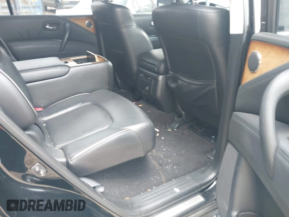 2012 Infiniti QX56 7-passenger with VIN JN8AZ2NEXC9015233, listed as a IAAI auction lot 42228817 with 110,020 mi miles and . Bid and sale history available at DreamBid. Image 8.