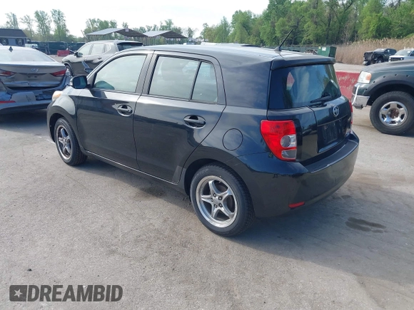 2009 Scion xD with VIN JTKKU10409J041654, listed as a IAAI auction lot 42036558 with 122,661 mi miles. Bid and sale history available at carsss.com. Image 3.