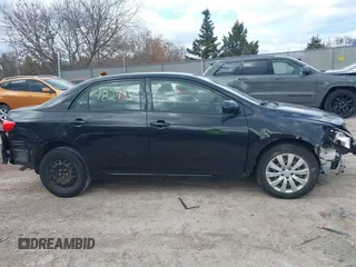 2012 Toyota Corolla L with VIN JTDBU4EE8C9180465, listed as a IAAI auction lot 41861829 with 163,631 mi miles. Bid and sale history available at carsss.com. Image 13.