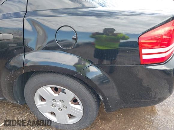 2010 Dodge Avenger SXT z VIN 1B3CC4FB7AN124485, wystawiony jako IAAI lot #42455131 z przebiegiem 241 003 mil mil oraz . Historia ofert i sprzedaży dostępna na DreamBid. Obrazek 14.