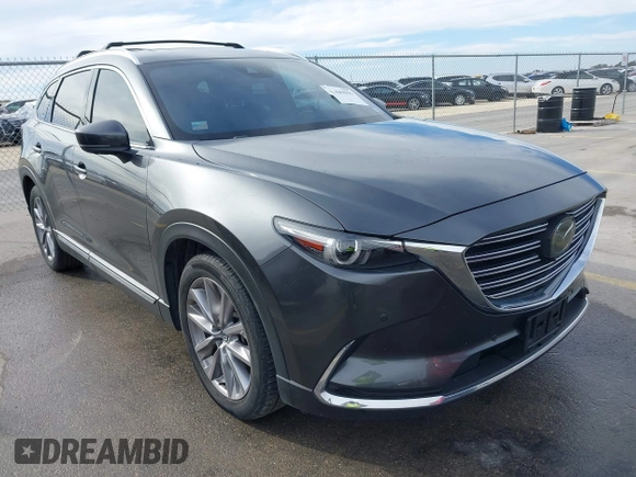 2023 Mazda CX-9 Grand Touring z VIN JM3TCBDY0P0631395, wystawiony jako IAAI lot #41449555 z przebiegiem 17 721 mil mil oraz . Historia ofert i sprzedaży dostępna na DreamBid. Obrazek 1.