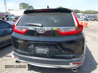 2018 Honda CR-V EX with VIN 7FARW1H53JE052029, listed as a IAAI auction lot 41890820 with 125,043 mi miles. Bid and sale history available at carsss.com. Image 16.