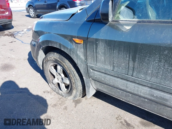 2006 Honda Pilot EX-L with VIN 5FNYF18596B016974, listed as a IAAI auction lot 41634049 with 161,687 mi miles and . Bid and sale history available at DreamBid. Image 12.