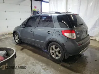 2009 Suzuki SX4 Man AWD with VIN JS2YB413496201977, listed as a Copart auction lot 84171644 with 136,908 mi miles and Salvage Title. Bid and sale history available at carsss.com. Image 2.