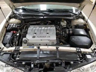 2003 Oldsmobile Aurora z VIN 1G3GS64C534171677, wystawiony jako Copart lot #74768254 z przebiegiem 113 932 mil mil oraz Tytuł czysty. Historia ofert i sprzedaży dostępna na DreamBid. Obrazek 11.