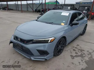 2022 Honda Civic Si with VIN 2HGFE1E51NH472363, listed as a IAAI auction lot 41632984 with 25,461 mi miles. Bid and sale history available at carsss.com. Image 2.