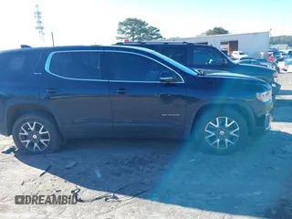 2021 GMC Acadia SLE with VIN 1GKKNKLA9MZ136112, listed as a IAAI auction lot 41212337 with 76,827 mi miles and . Bid and sale history available at DreamBid. Image 13.
