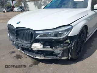 2017 BMW 7 Series 750i with VIN WBA7F0C32HGM22273, listed as a IAAI auction lot 41857151 with 90,518 mi miles and . Bid and sale history available at carsss.com. Image 6.