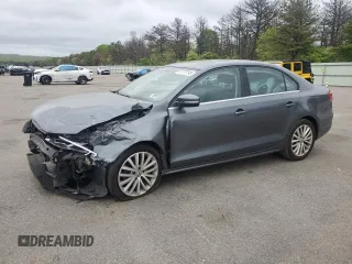 2014 Volkswagen Jetta SEL с VIN 3VWL17AJ8EM406197, выставлен на аукционе Copart как лот 57777195 с пробегом 107 120 миль миль и Списание • Salvage title. История ставок и продаж доступна на DreamBid. Изображение 1.